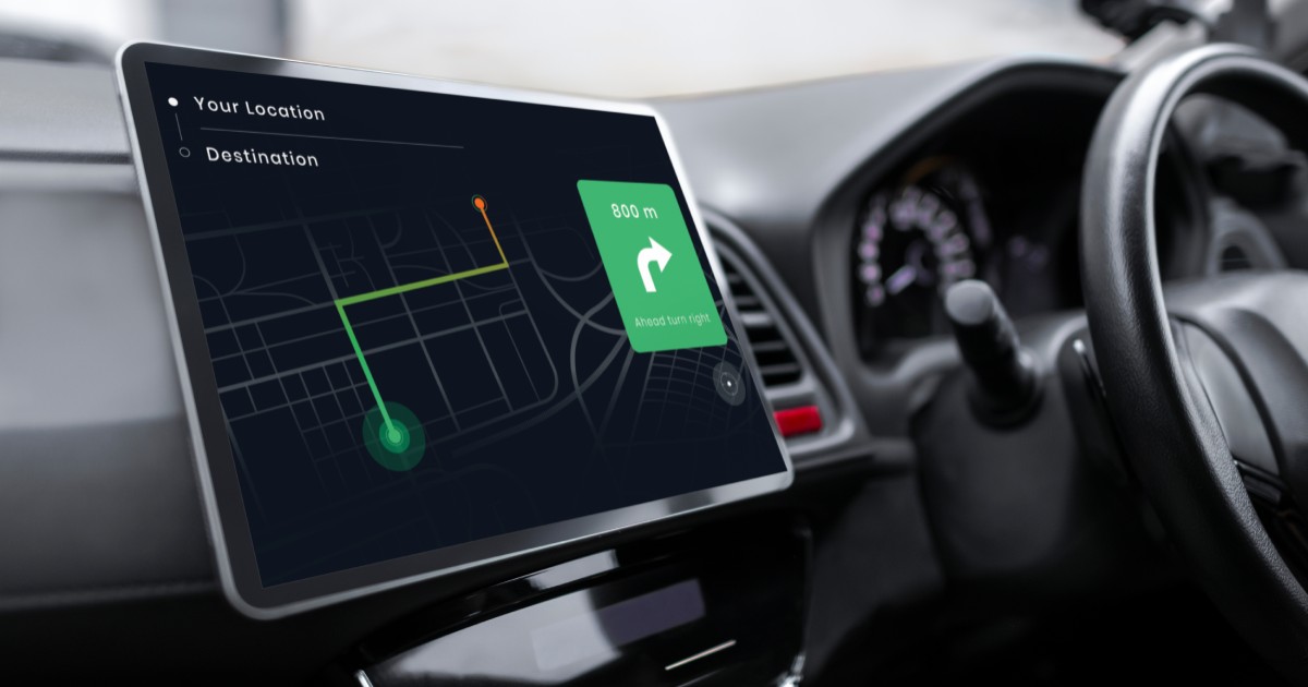 Closeup of a tablet with GPS tracking in a car